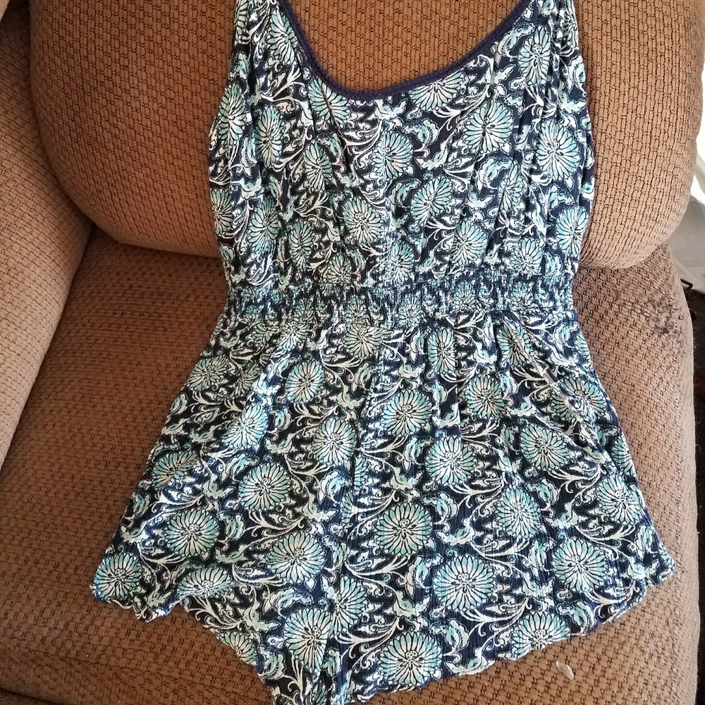 Floral romper with braided straps